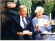 Bill & Mavis reading congratulations on their 50th wedding anniversary